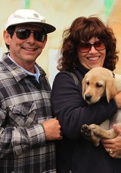 Karen and Manny with Asia III at the Puppy Truck