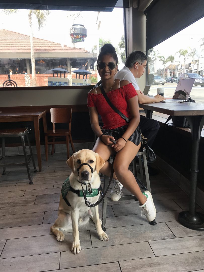 Avanthi with Dover at a restaurant