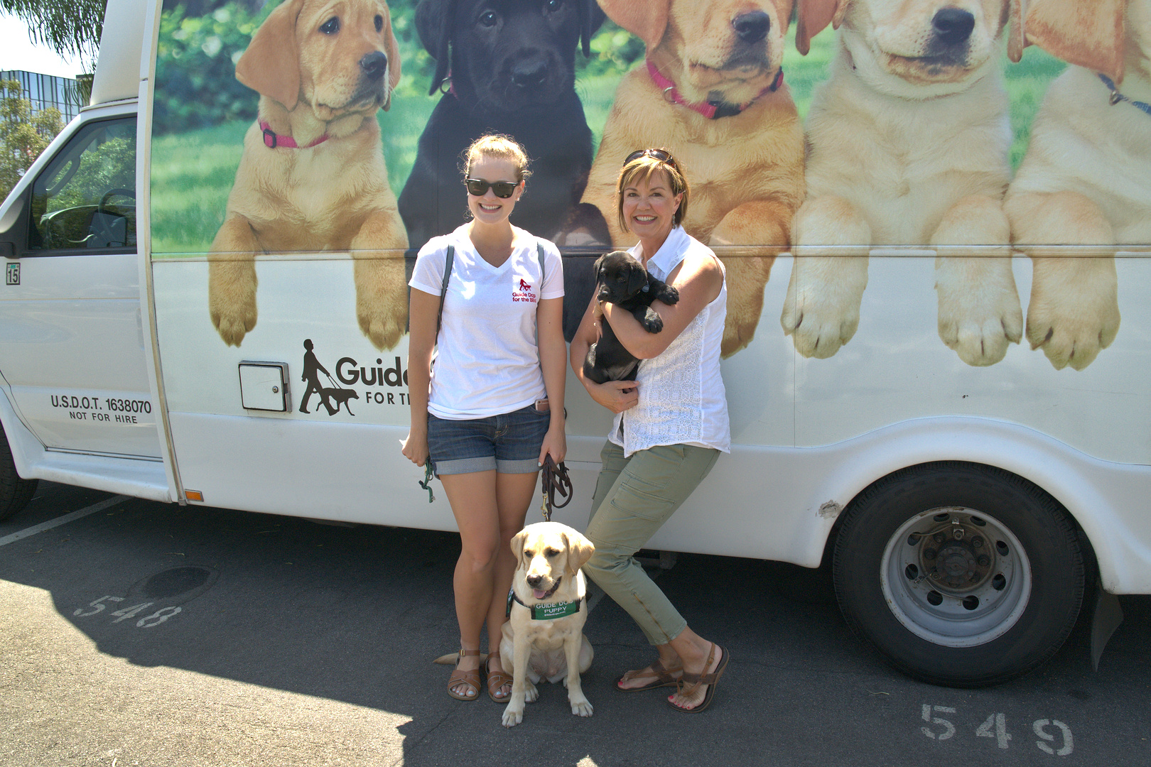 Kelsea with Amari I and Denise with Jess IV at the Puppy truck 2017-08-12